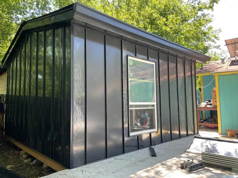 Black standing seam metal wall panels for Metal Roof Installation in Summit View